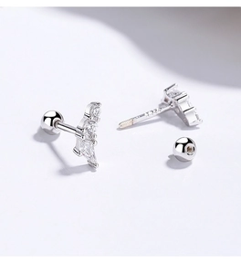 Detailed macro view of S925 sterling silver geometric earring with screw ball back and zircons