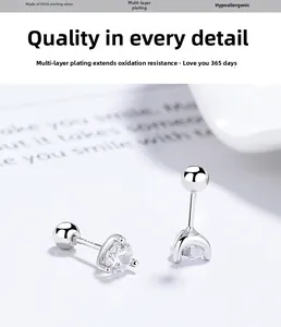 Detail showing S925 sterling silver screw back stud earrings with three-prong zircon