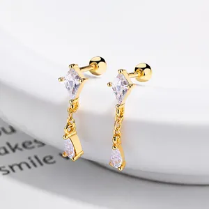 Orecchini a perno geometrici in argento S925 dorato con pendente a goccia in zircone e chiusura a vite