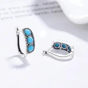 Retro S925 silver hoop earrings with three turquoise stones and bohemian gear engraving