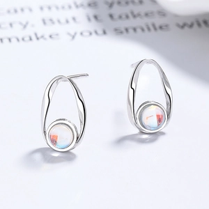 Minimalist S925 silver stud earrings with oval frame and iridescent moonstone
