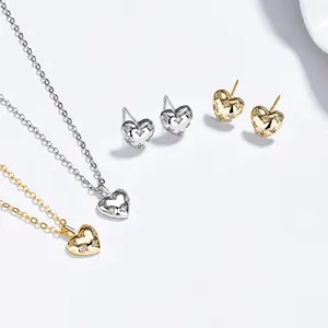 Set collana e orecchini a cuore in argento S925 con accenti di diamante in oro e argento