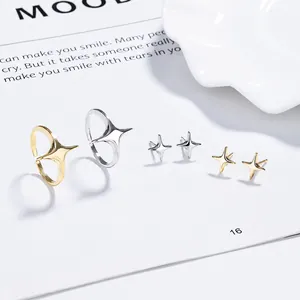 Elegante set di anello e orecchini a stella a quattro punte in argento S925 e oro e argento
