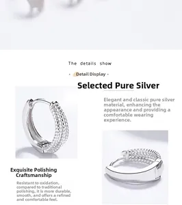 Détails macro des boucles d'oreilles créoles à trois couches en argent 925 avec fini poli