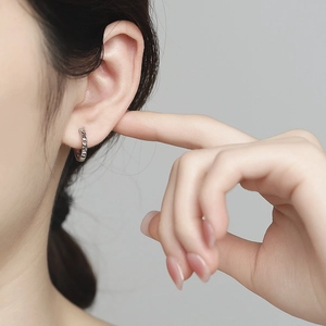 Minimalist 925 sterling silver chain hoop earrings shown on model for women