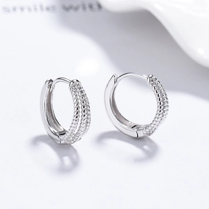 Boucles d'oreilles créoles S925 en argent fin avec texture torsadée à trois couches polie
