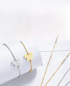 Close-up of S925 sterling silver butterfly pendants with gold and silver plating detail