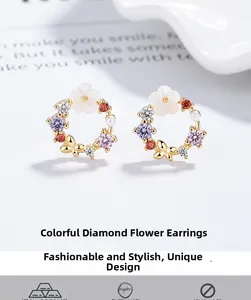 Macro detail of 925 sterling silver butterfly floral studs with colorful zirconia stones