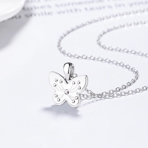 Elegant 925 sterling silver butterfly pendant necklace with textured wings on a delicate chain
