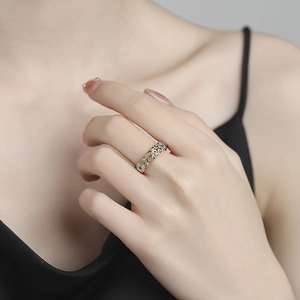 S925 sterling silver ring with hollow patterns and gold heart accents for women