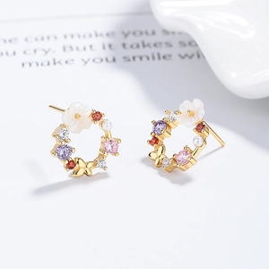 925 silver butterfly flower wreath studs with multi-color zircons on white surface