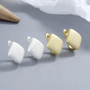 Brushed matte geometric hoop earrings in silver and gold finishes for women