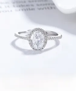 Macro shot of 925 sterling silver ring with oval cut gemstone and side diamonds