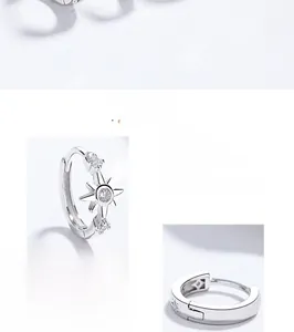 Close-up of S925 sterling silver star-shaped hoop earrings with sparkling zircon stones