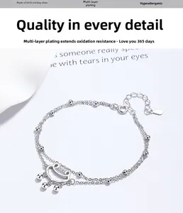 Close-up of S925 sterling silver double-layer bead bracelet with traditional Ruyi lock charm