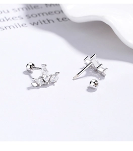 Macro shot of 925 silver crown earrings with cubic zirconia and screw-back detail