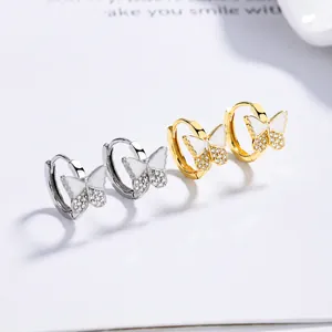 Élégantes boucles d'oreilles papillon en argent 925 avec émail blanc et zircons brillants