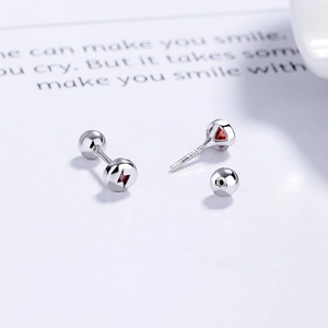 925 silver screw back studs featuring a red lightning bolt on round polished discs