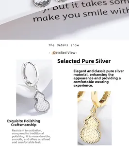 Detail of S925 sterling silver gourd earrings with textured finish in gold and silver