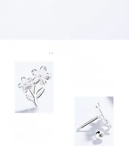 Macro detail of 925 sterling silver flower earrings with secure screw back closure