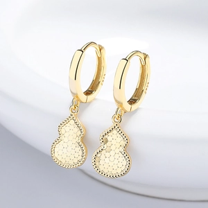 925 silver gourd-shaped hoop earrings with gold finish and textured detail on white background