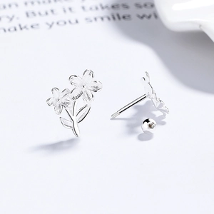 Elegant 925 sterling silver floral stud earrings with secure screw back closure
