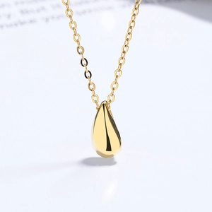 Elegant 925 sterling silver gold teardrop pendant necklace for women on white background