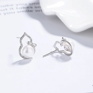 S925 silver gourd pearl stud earrings with sparkling cubic zirconia and bow detail