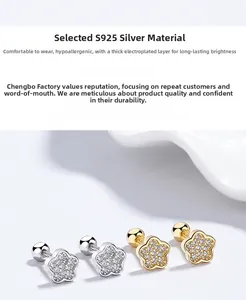 Close-up of S925 silver flower stud earrings with zircon inlay and screw backs
