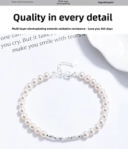 Detailed view of S925 sterling silver clasp and lustrous pearls on a minimalist bracelet