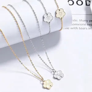 Collana con ciondolo a fiore in argento 925 con texture a nido d'ape in oro e argento