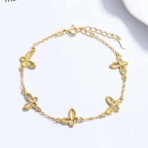 Elegantes 925er Sterlingsilber Schmetterling Armband mit fünf goldenen Anhängern für Damen