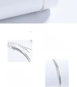 Close-up of a 925 sterling silver snake chain with lobster clasp and extension link