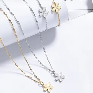 Detail view of 925 silver flower necklace and bracelet set in gold and silver finish