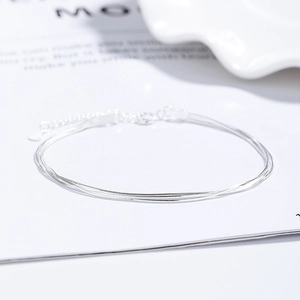 Three-layer 925 sterling silver snake chain bracelet with heart charm and lobster clasp
