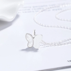 Élégant collier papillon en argent sterling S925 avec ailes asymétriques pour femmes