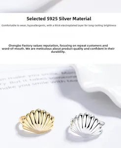 Detailed macro view of S925 silver shell rings in gold and silver plating finishes