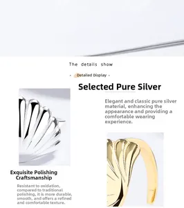 Macro shot of polished 925 sterling silver shell rings in gold and silver finishes