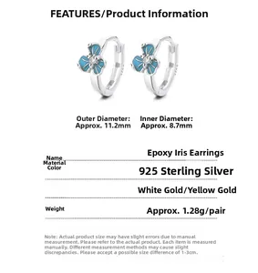 Détails des boucles d'oreilles iris en argent 925 avec résine bleue et diamants