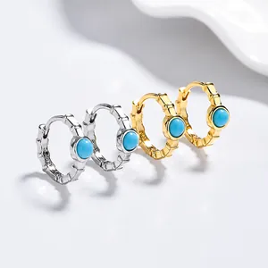 Orecchini a cerchio stile bambù in oro e argento con inserti in turchese blu