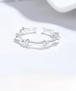Close-up of 925 silver bamboo-style ring with sparkling cubic zirconia inlays