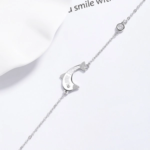 925 silver dolphin bracelet featuring LOVE engraving and a sparkling zircon stone