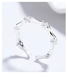 Macro detail of 925 sterling silver bamboo ring with sparkling cubic zirconia accents