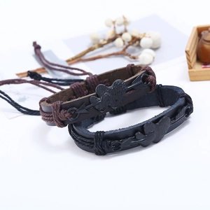 Handmade woven faux leather heart and arrow couple bracelets set in black and brown