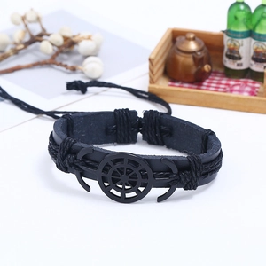 Retro black braided leather bracelet featuring anchor and helm nautical elements
