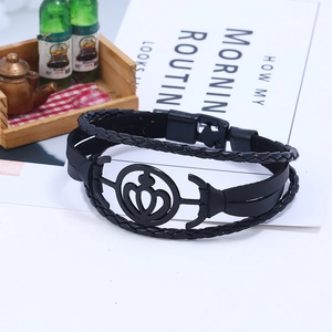Multi-layer black leather bracelet featuring matte anchor and crown metal charms