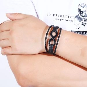 Braided black leather infinity symbol multilayer bracelet for men on male wrist