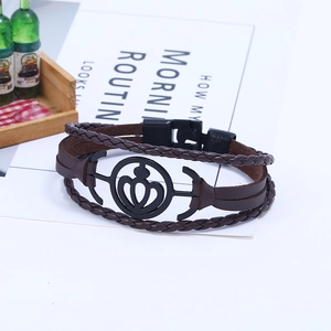 Detailed macro shot of braided leather bracelet with crown anchor buckle and matte finish