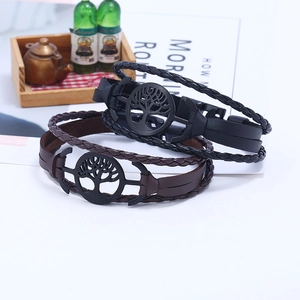 Handmade leather tree of life bracelets in black and brown with metal clasp