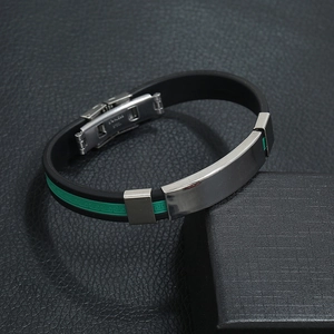 Detail of male silicone bracelet with stainless steel clasp and Greek key pattern